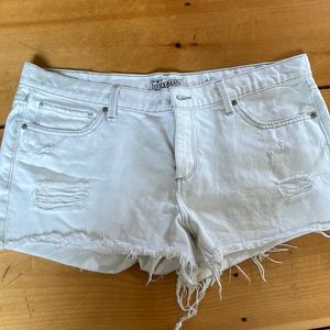 White distressed shorts